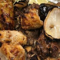 Bbq Platter · Pieces of chicken kabab, chicken tikka, chicken boti, beef kabab served over special rice, s...