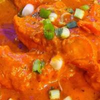 Butter Chicken · Boneless chicken slow simmered in a super delicious creamed tomato sauce.
