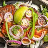 Tandoor Pomfret Fish · This is one of our popular and specialty item and marinated pampano fish cooked in tandoor o...
