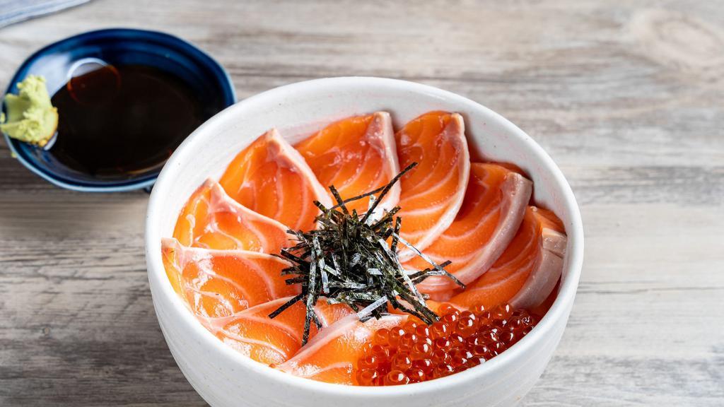 Salmon Donburi · Salmon sashimi and ikura over rice.