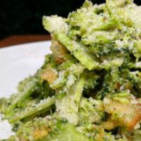 Shaved Broccoli Caesar · crostini, frico, parm