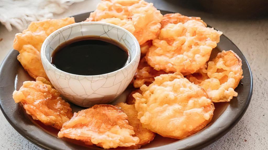 Sweet Potato · Tempura battered sweet potato chips, served with spicy mayo, and sweet sauce.