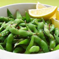 Edamame · Steamed soybeans beans, lightly salted with lemon wedge.