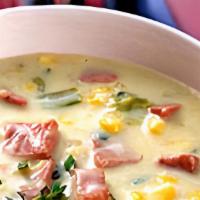 Savory Corn Soup · Cream of corn soup, with a light kick, topped with crispy pastrami.