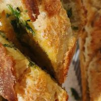 Garlic Bread · Freshly toasted Italian Bread with extra virgin olive oil and garlic