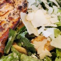 Traditional Caesar Salad (Large) · Romaine lettuce, Parmesan cheese, garlic-herb croutons, caesar dressing.
