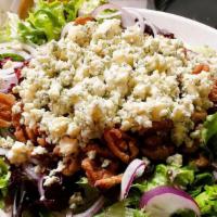 Gorgonzola Salad (Large) · Mesculin greens, diced tomatoes and glazed walnuts topped with fresh imported Gorgonzola che...