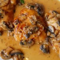Chicken Marsala · Pan seared chicken, mushrooms braised in a rich marsala wine sauce. Served with pasta or sid...