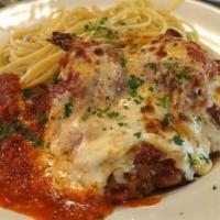 Shrimp Parmesan Dinner · 6 Jumbo Breaded shrimps topped with tomato sauce and mozzarella. Served with pasta or side s...