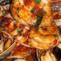 Seafood Combination · Clams, shrimp, mussels and calamari  in garlic white wine sauce or marinara sauce