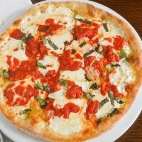 Tradtional Marghertia Pizza · Fresh Mozzarella Cheese, San Marzano Tomato Sauce, Parmesan, Basil.