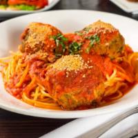 Vegan Spaghetti & Meatballs · Housemade Seitan Meatballs, Tomato Sauce and Cashew Parmesan.