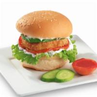 Spicy Sweet Potato Zinger Burger · Extra spicy vegan burger filled with sweet potato masala tikki, cilantro chutney and dil-dil...