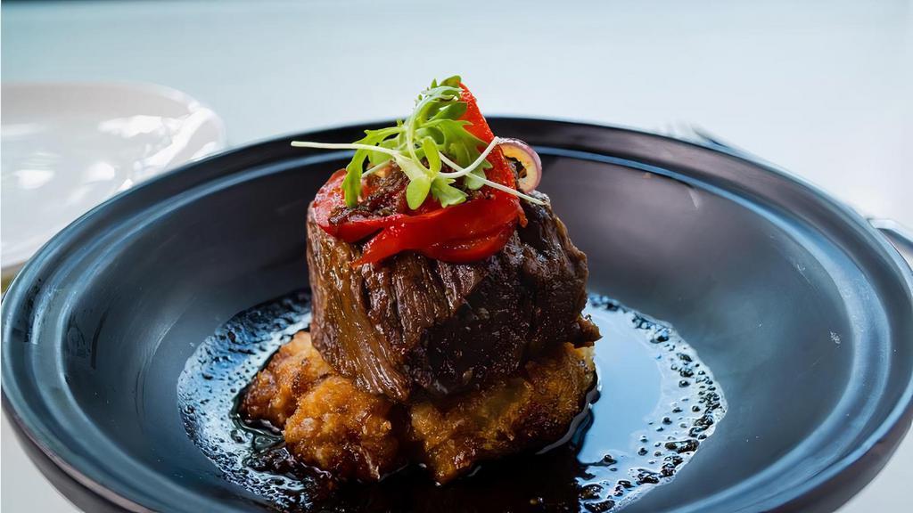 Short Rib · 24 hours braised black Angus short rib with Korean galbi sauce. Crispy mashed potato. Sauteed julienne of red pepper and red onion.