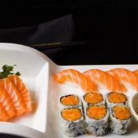 4 Ways Salmon · Six pieces sashimi, four pieces sushi and spicy salmon roll and salmon tartar.