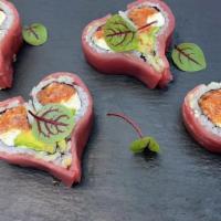 Valentines Roll · crunchy spicy tuna, cream cheese and avocado with 
spicy aioli roll, topped with bluefin tuna