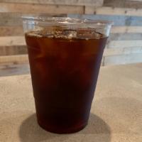 Iced Americano · Two shots of espresso and ice water.