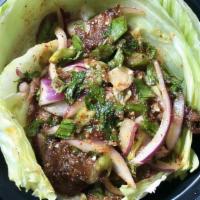 Spicy Beef Salad · Spicy. Grilled beef with red onion, white onion, mints, thai rice powder, thai dry chili, sc...