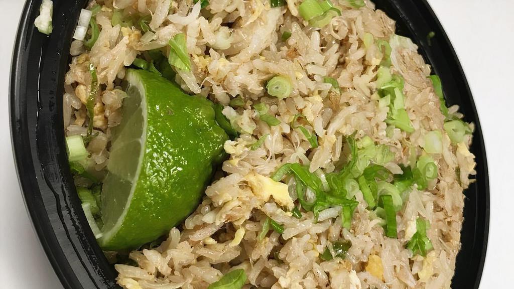 Crab Fried Rice · Crab meat sautéed with egg, white onion and scallion.