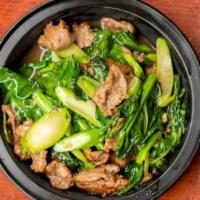 Beef Asian Broccoli · Sautéed beef with brown sauce, garlic and Chinese broccoli.