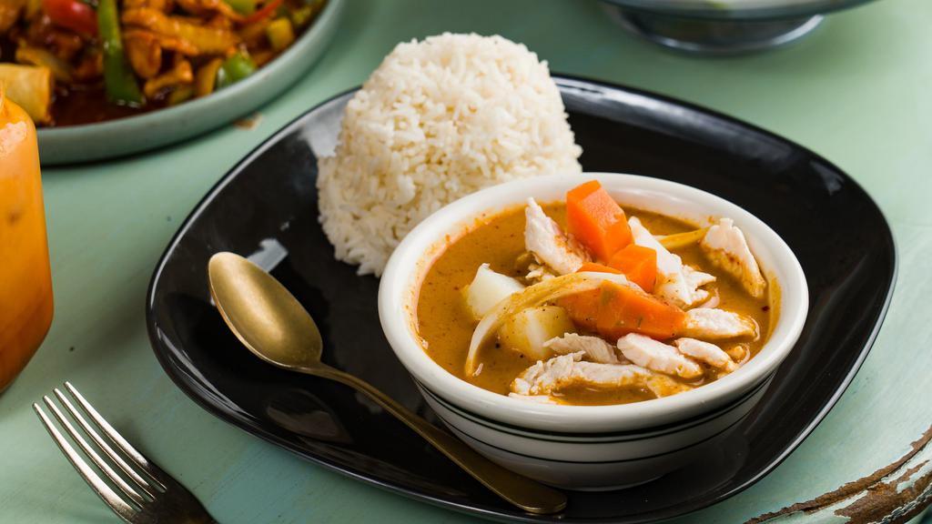 Massaman Curry · Medium spicy. White onion, carrot, potato, peanut curry paste.