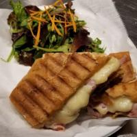 Cuban Sandwich · Roasted pork, ham, Swiss cheese, pickles, mustard, served with mix green salad