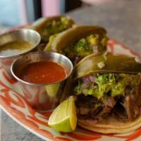 Barbacoa Tacos · lamb barbacoa, cilantro, red onion, pickled jalapeno, guacamole