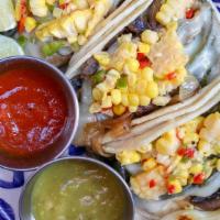 Surf & Turf Tacos · mushroom, caramlizes onion, poblano peppers, pepper jack cheese, corn salsa