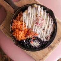 Enchilada Suizas · muenster cheese, rice, black beans, sour cream, cotija cheese, salsa verde