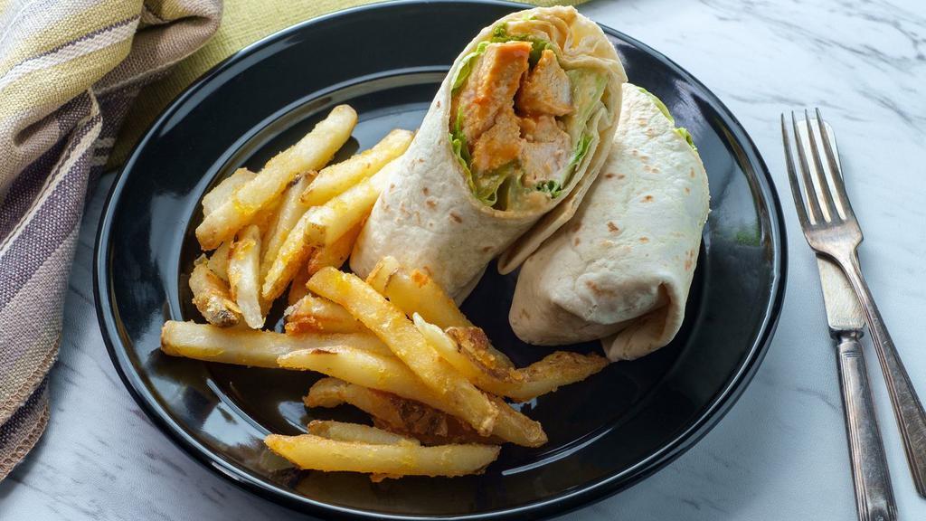 Buffalo Blue Wrap · Fresh wrap made with Crispy chicken tenders tossed in your choice of hot sauce, lettuce, tomato, onions, crispy tortilla strips and blue cheese dressing.
