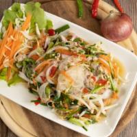 Thai Chili Salad · Crisp romaine lettuce, tomato, sliced Mandarin oranges and Asian vinaigrette.