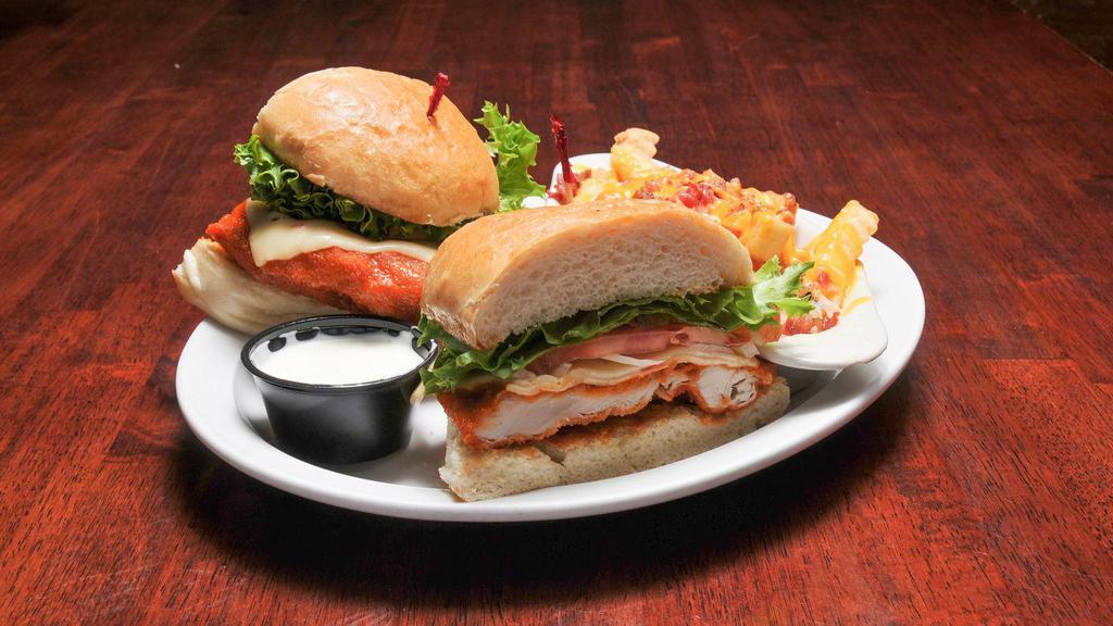 Crispy Buffalo Chicken Sandwich · Our all natural chicken breast fried in our famous breaded recipe, tossed in Buffalo sauce, topped with pepper jack cheese and fresh romaine lettuce.