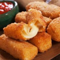 Mozzarella Sticks · 6 pieces of melted mozzarella cheese battered and fried to perfection. Served with Marinara ...