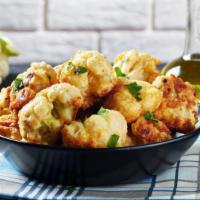 Battered Cauliflower · Fresh cauliflower dipped in batter and fried to perfection.