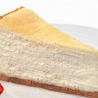 Ny Style Cheesecake · Traditional ny style cheesecake made with cream cheese and a graham cracker crust. Per slice.