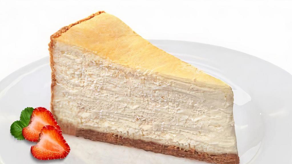Ny Style Cheesecake · Traditional ny style cheesecake made with cream cheese and a graham cracker crust. Per slice.