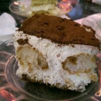Homemade Tiramisu · Layers of espresso drenched lady fingers, separated by mascarpone cream and dusted with coco...