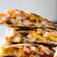 Chicken Quesadilla  · Shredded mozzarella cheese, avocado and grilled chicken served with sour cream