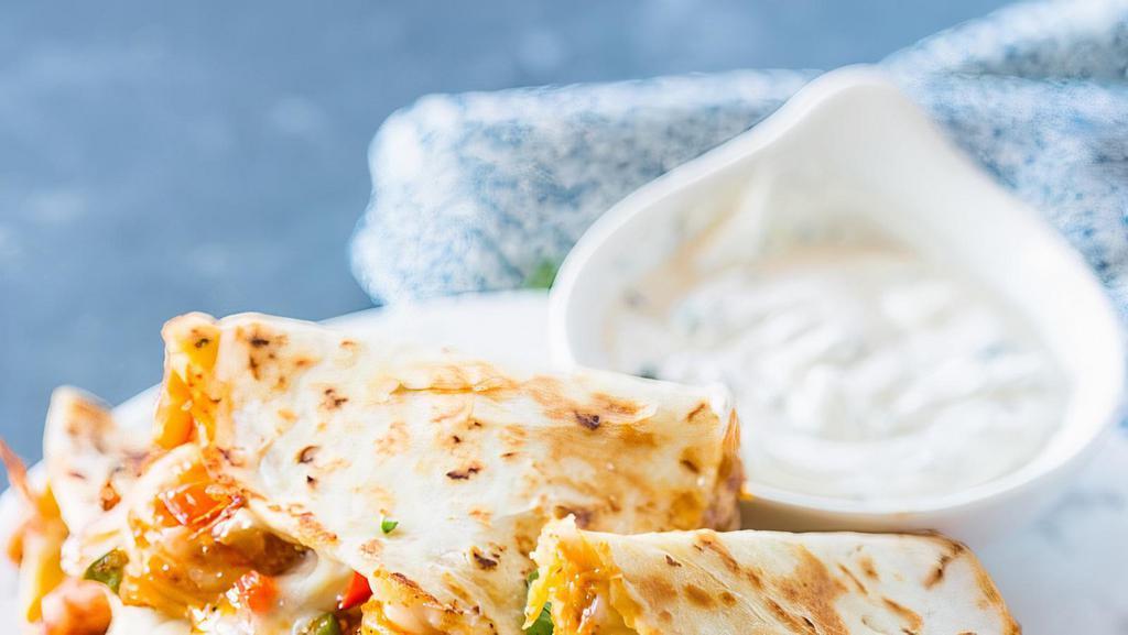Shrimp Quesadilla  · Grilled shrimp, shredded mozzarella cheese, sautéed mixed bell peppers and avocado served with Sour cream.