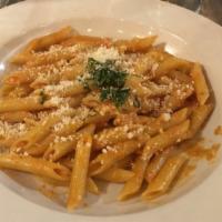 Penne Alla Vodka · Penne with a creamy pink sauce.
