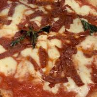 Diavola Pizza · Pomodoro, hot soppressata, pizza dough, raw tomatoes, fresh mozzarella, fior di latte, fresh...