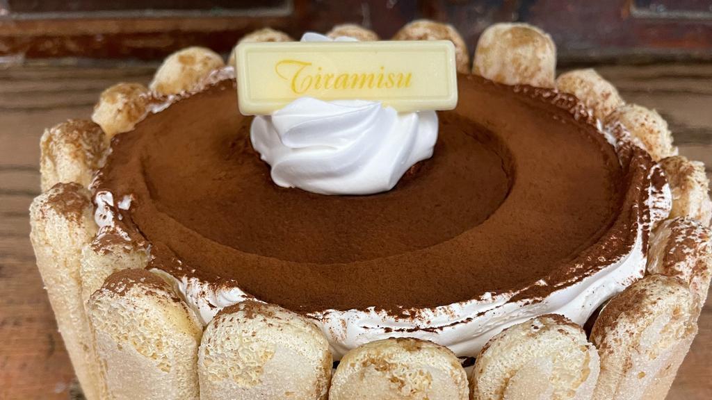 Tiramisu · Filled with lady fingers and whipped mascarpone cheese with espresso coffe.