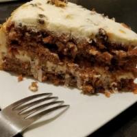 Carrot Cake · Moist cake with nuts, raisins, and cream cheese frosting