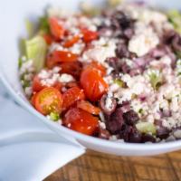Georgia'S Greek Salad · Iceberg and romaine lettuce, tomato, cucumber, kalamata olives and feta cheese, served with ...