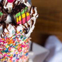 The Rainbow Cookie Shake · Vanilla ice cream, raspberry puree, chocolate syrup, rainbow cookie pieces and rainbow sprin...
