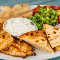 Chicken Platter · Marinated grilled chicken breast served with pita bread, tzatziki, lettuce, tomatoes and lem...
