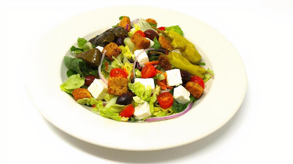 Greek Salad (Large) · Our house salad with feta, kalamata olives, pepperoncini and stuffed grape leaves. Small 1 dressing large 2 dressings.