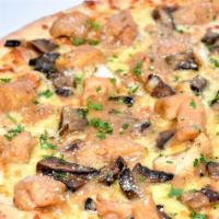 Chicken Marsala Pizza · Sautéed chicken, portobello mushrooms, Marsala wine sauce, shredded mozzarella and fresh par...