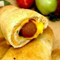 A Tuffy Dog · Sabrett all beef hot dog, American cheese, wrapped in a pizza dough blanket.