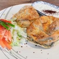 Spinach Pie · Rose borek. Two pieces. Home baked phyllo dough filled with spinach and feta cheese. Side of...